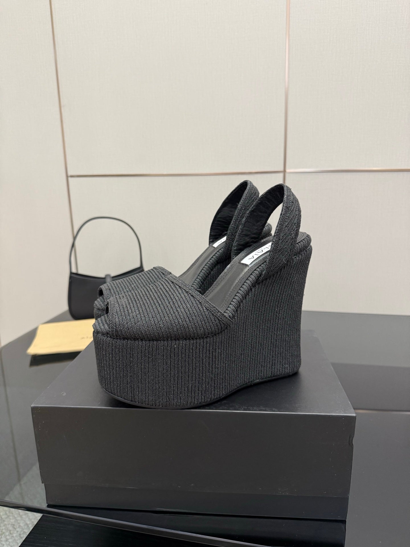 ALAIA platform sandal black sheepskin 389631