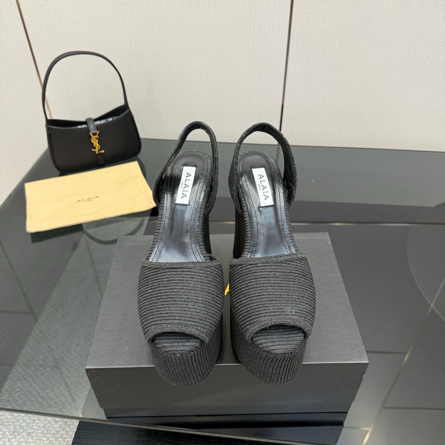 ALAIA platform sandal black sheepskin 389631