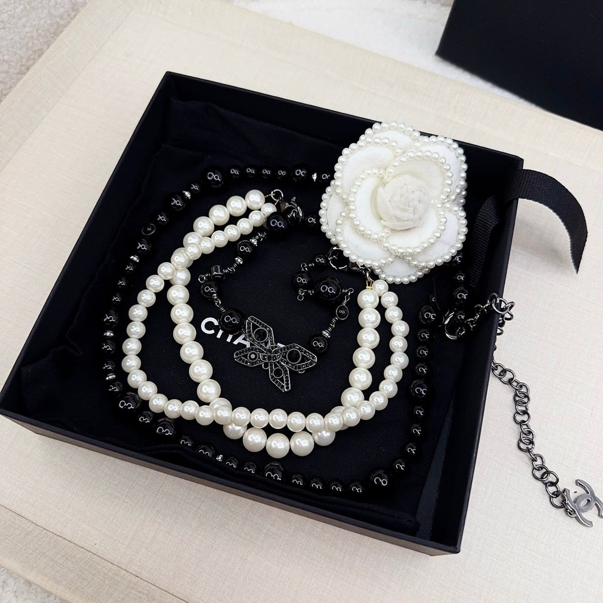 Chanel 2026 Hand-Woven Pearl Waist Chain Black 218095