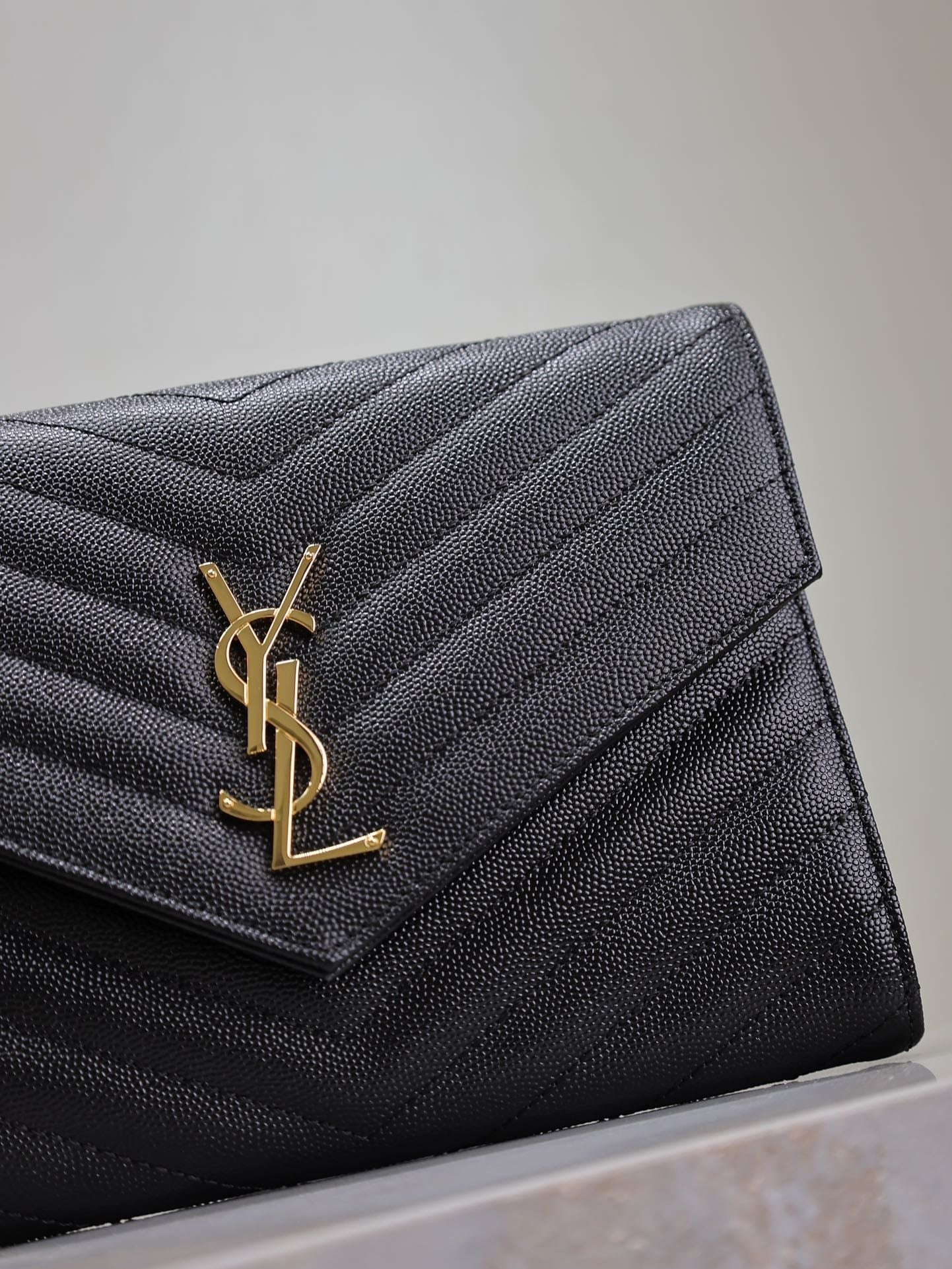 CASSANDRE CLUTCH 21 IN BLACK LAMBSKIN GOLD HARDWARE