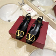 VLOGO BLACK LEATHER SLINGBACK FLATS