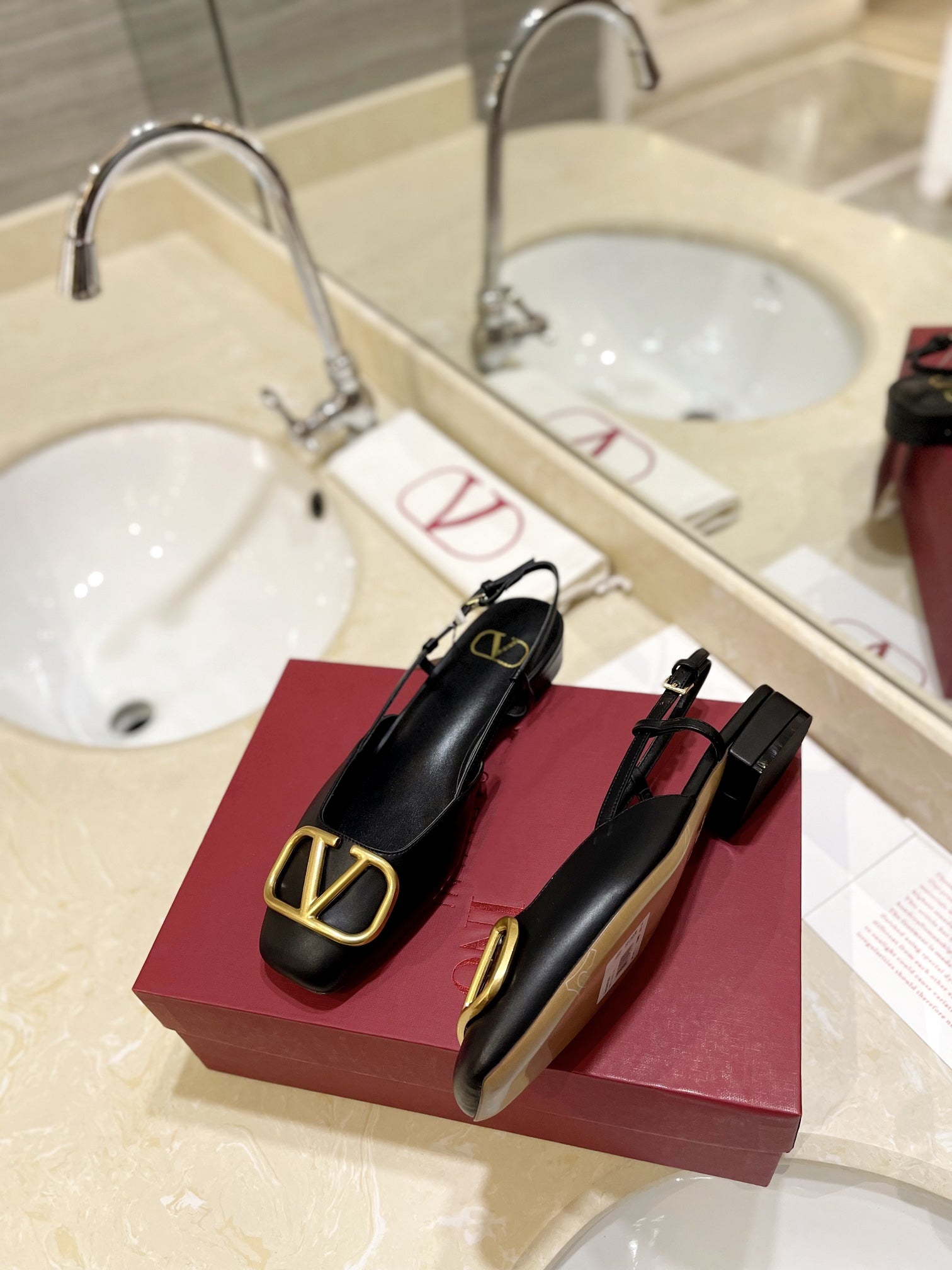 VLOGO BLACK LEATHER SLINGBACK FLATS