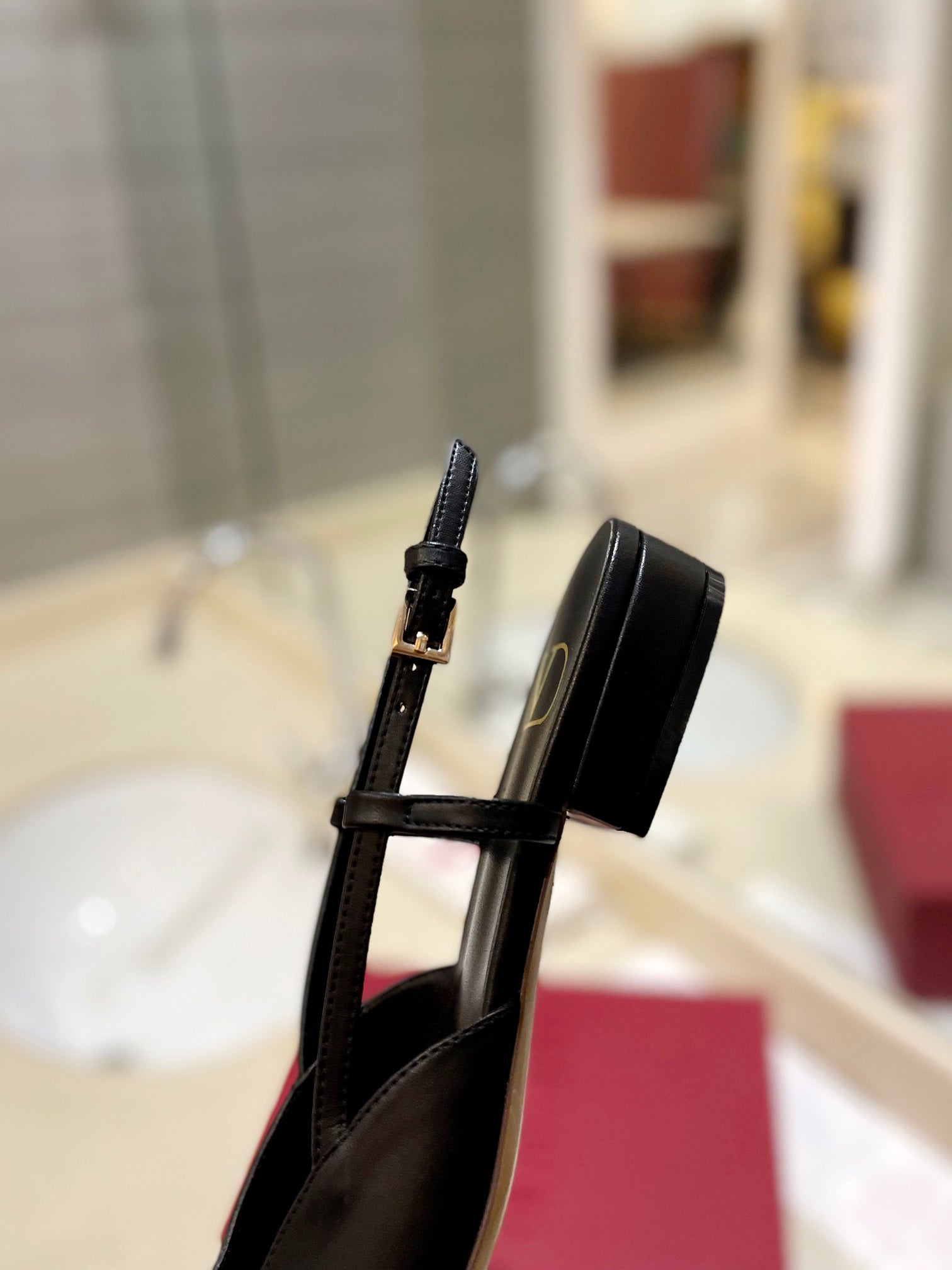 VLOGO BLACK LEATHER SLINGBACK FLATS