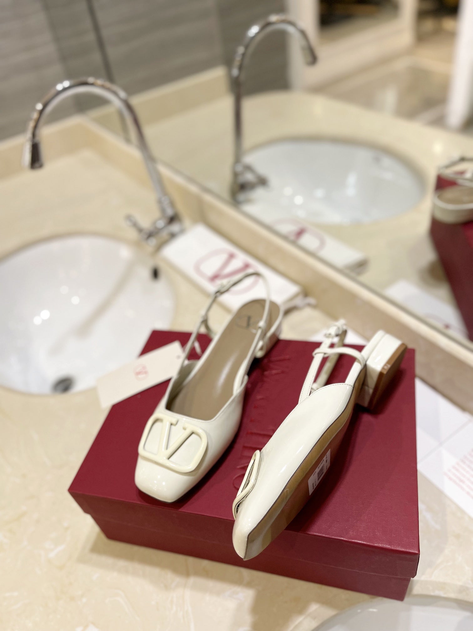 VLOGO WHITE PATENT LEATHER SLINGBACK FLATS