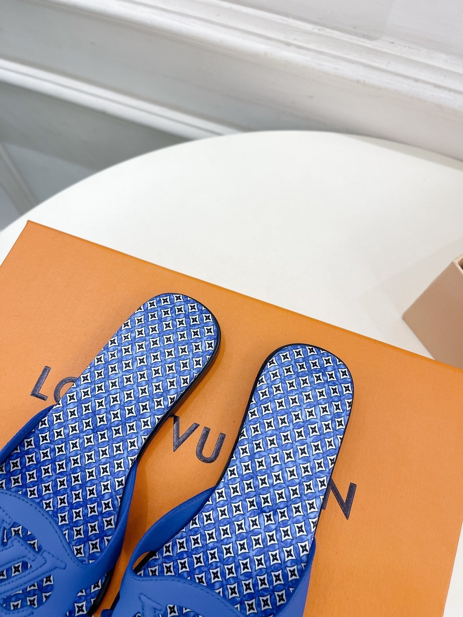 lv sandal isola flat mule blue calfskin star monogram